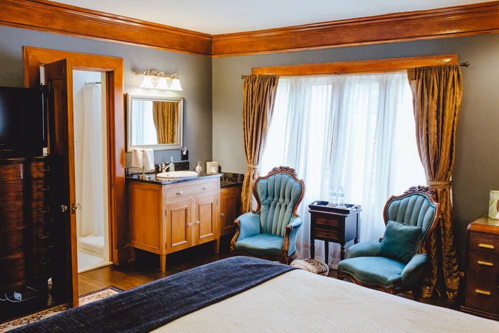 The in-room sink is located next the large window and reading area