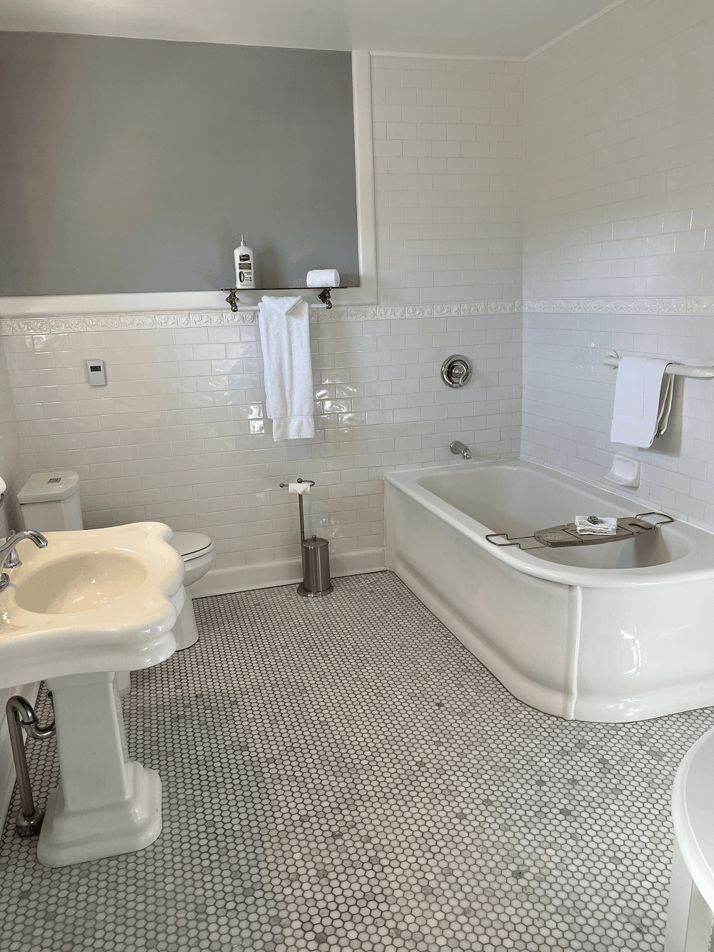 Ensuite bath with a large soaking tub, separate shower, and heated floors